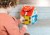 83263-5414834832631-LILLIPUTIENS-Drewniany-domek-manipulacyjny-z-zamkami-Lisek-Wlamywacz-3-lata-plus-(10).jpg