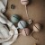 mushie-etui-na-smoczek-do-wozka-kula-ball-stone (1).jpg