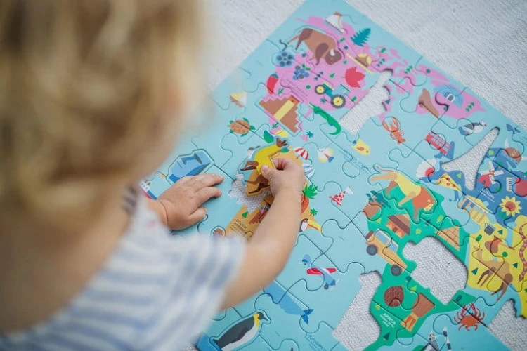 pol_pl_Mudpuppy-Puzzle-Mapa-Swiata-z-elementami-w-ksztalcie-budynkow-i-zwierzat-5-5820_8.jpg