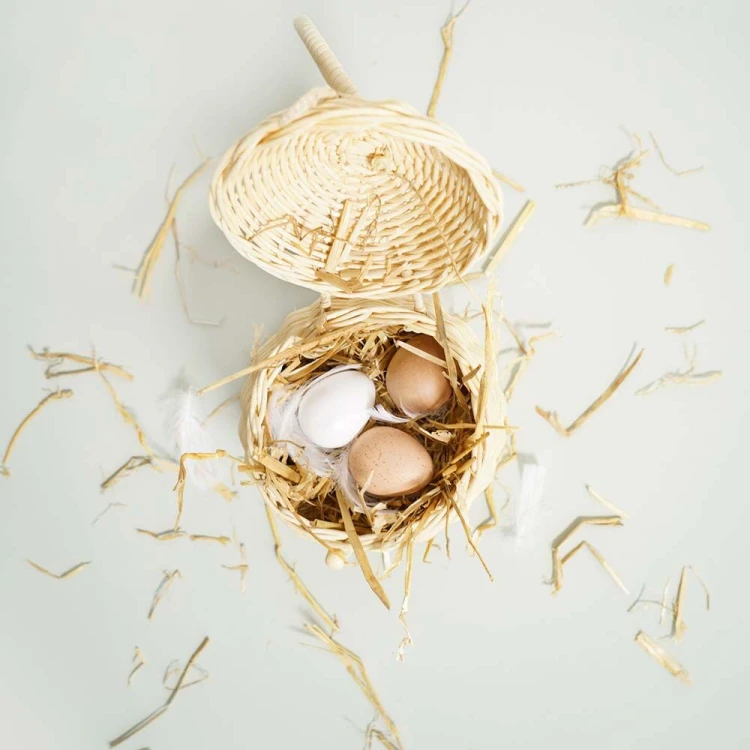 big_TV190-eggs-in-wicker-basket-with-feathers-and-hay.jpg