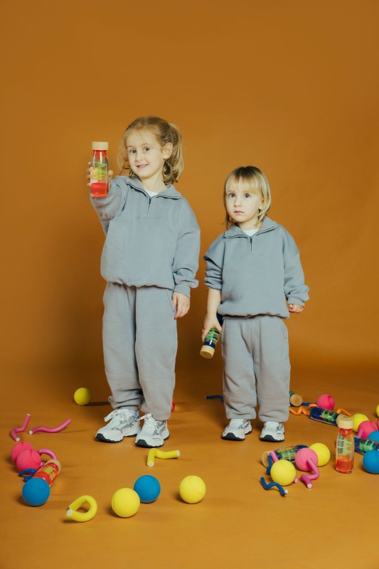 Butelka sensoryczna, dwufazowa MOVE SPIRALA różowa Petit Boum